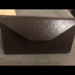 Gucci su glass case